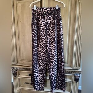 Women’s brand new size medium cheetah flare pants with buttons